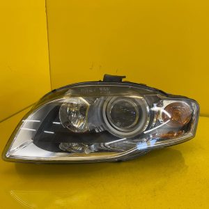 Reflektor Lampa Lewa Audi A4 B7 XENON 8E0941003BM Nieskrętna