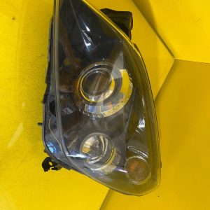 Reflektor Lampa Lewa Opel Astra III H Xenon Nieskrętna