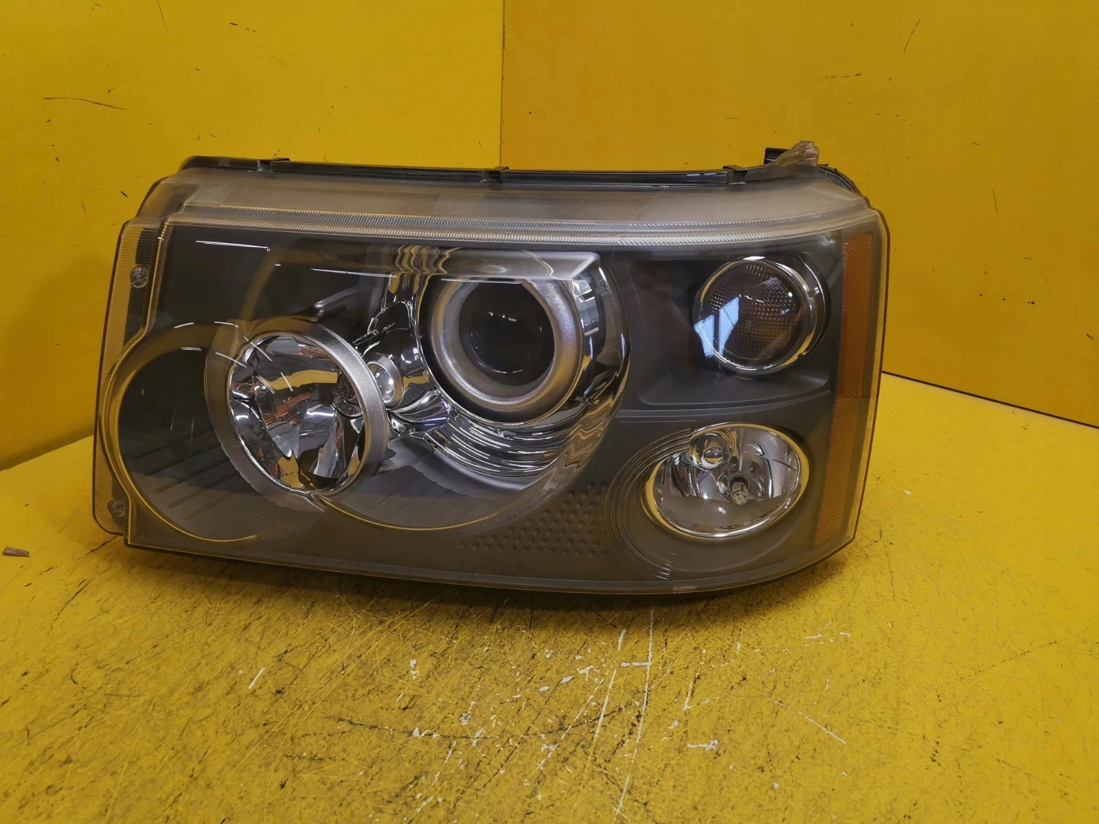 Reflektor LAMPA LEWA RANGE ROVER SPORT 05-09 ZWYKŁA L320 Autolamps Reflektor LAMPA LEWA RANGE ROVER SPORT 05-09 ZWYKŁA L320