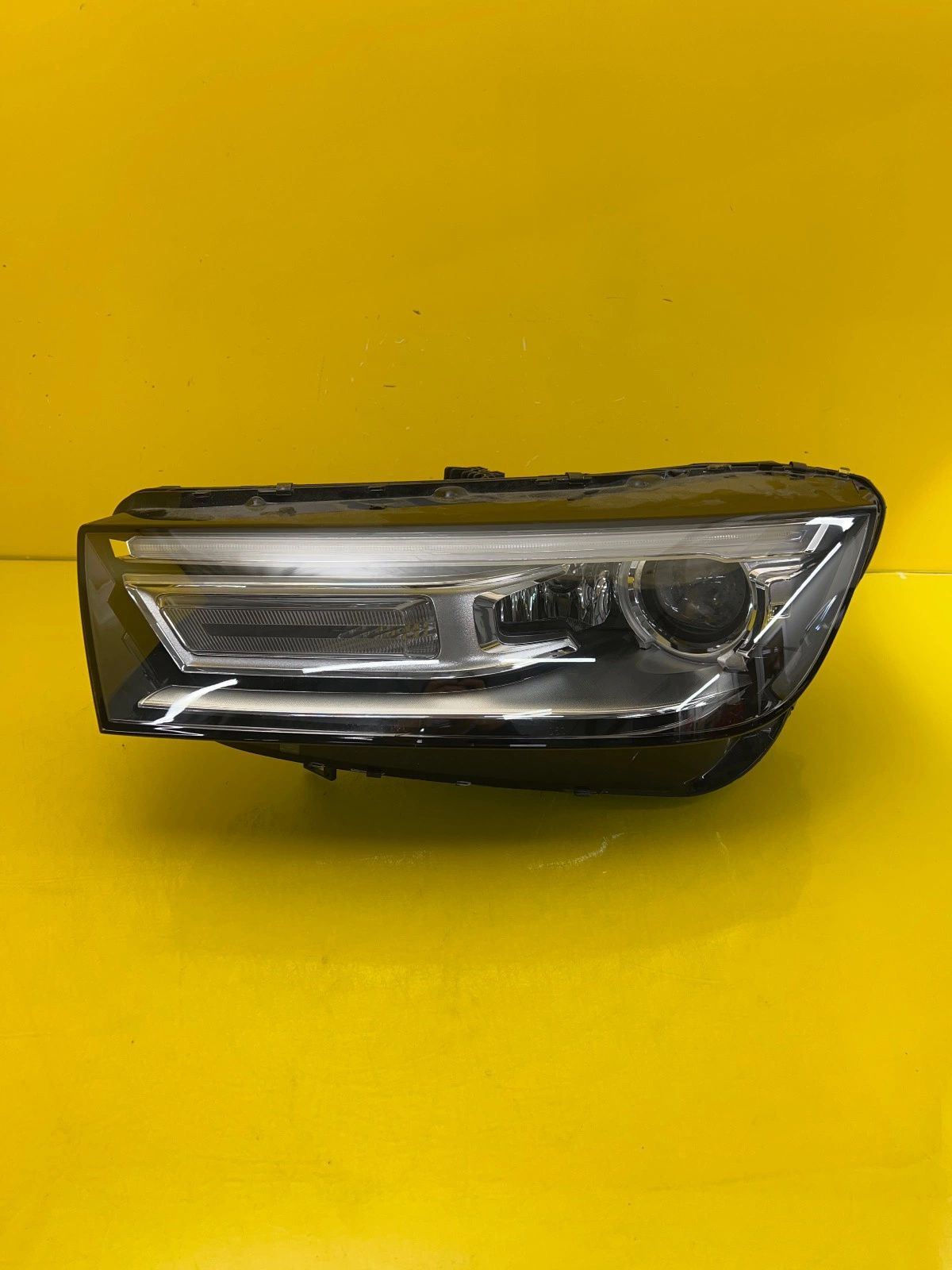 Reflektor Lampa Lewa Audi Q5 80A 16- Bi Xenon 80A941005 USA Autolamps Reflektor Lampa Lewa Audi Q5 80A 16- Bi Xenon 80A941005 USA